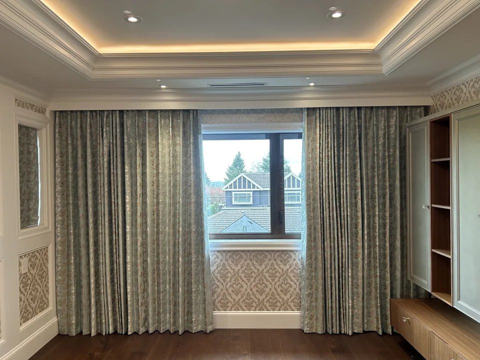 The same patterned curtains, opened