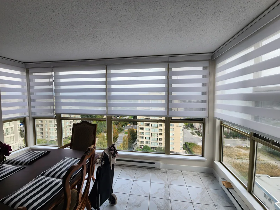 Dual shades around a dining area