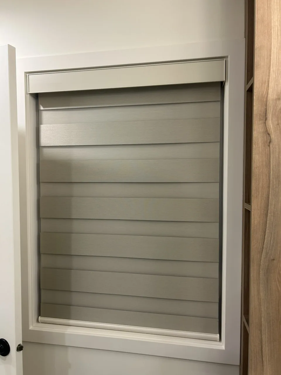 Dual shades within a framed opening