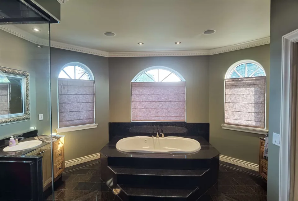 Fabric below three arched windows