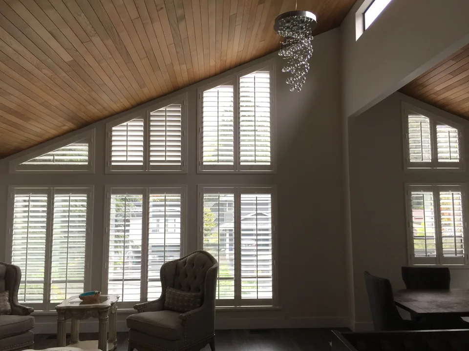 Shutters that follow a sloping ceiling