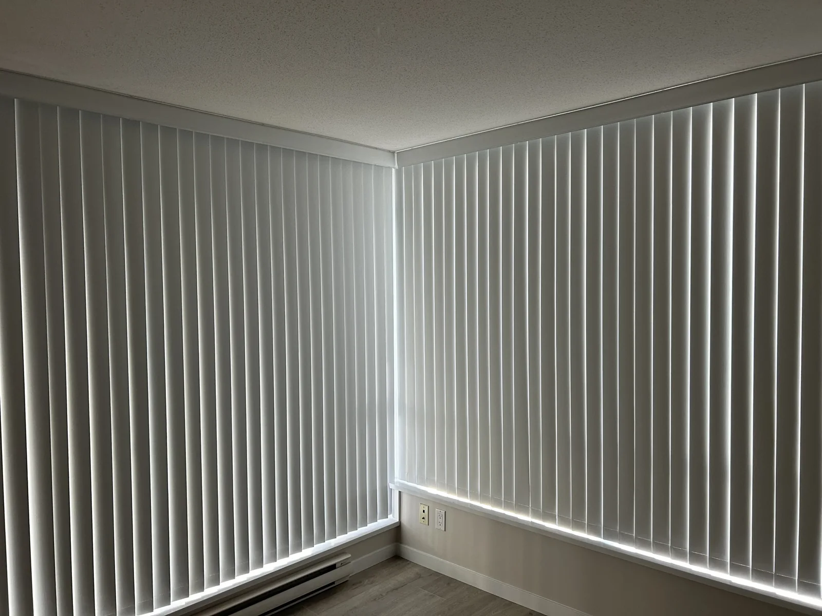 Vertical blinds in a room from the AAA Blinds photo library